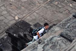 Therese scales the very steep and high steeps up to the main temple area. Therese has conquered her phobia of heights on the trip.