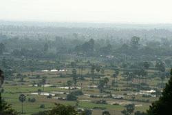 Overlooking the flat landscape of central Cambodia from the hilltop temple of Phnom Bakheng