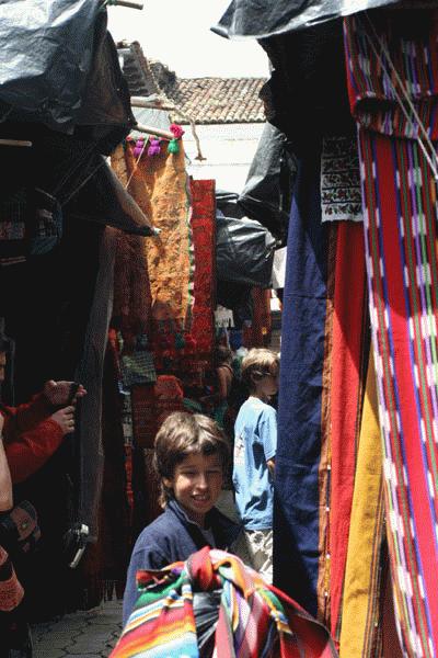 Paul at the Chichi market gets ready for some tough negotiations to settle on a price for a beautiful weaving.