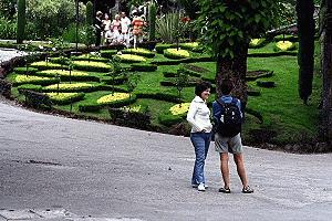 Therese and Fernindinha talk in the garden area of Bom Jesus.