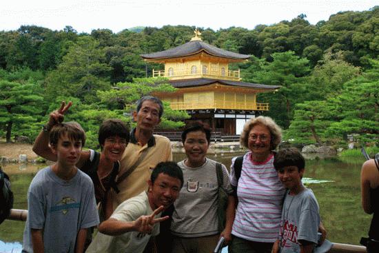 Hayato, a former international student who stayed with us,  and his parents, Takako and Ikurou, pose for a picture in front of the Golden Temple, a UNESCO World Heritage Site, in Kyoto.