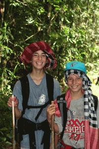 Trekkers Peter and Paul display big smiles after eluding a King Cobra on day 3.