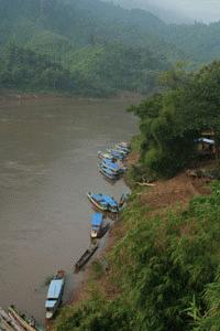 We walk down to the boats in preparation for our trip down the Nam Ou and Mekong Rivers