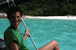 Therese is all smiles as she prepares to disembark into the azure waters and white beaches of Turtle Beach, Prehentian islands.