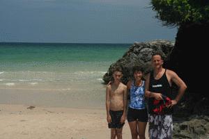 Our dear friend Bill, Therese and Peter take a plunge in the blue waters of the Gulf of Thailand.