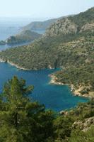 Hiking along the blue coast of the Aegean sea near Fethiye