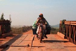 Going into traffic coming the other way is a way of life on the road to Siem Reap.