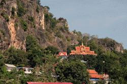 This small hill and temple were the only elevated land masses along this very flat road.