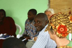 Pastor Edward, the Director of the Victory Community Gardens, appears very pleased with the community workshops we led.