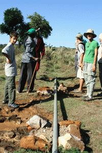 We survey the main drinking water line with Julius before working on the new source