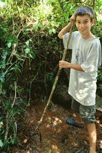 Paul clears the area after discovering the the first of five springs