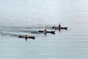 Fishermen racing for the best spot.