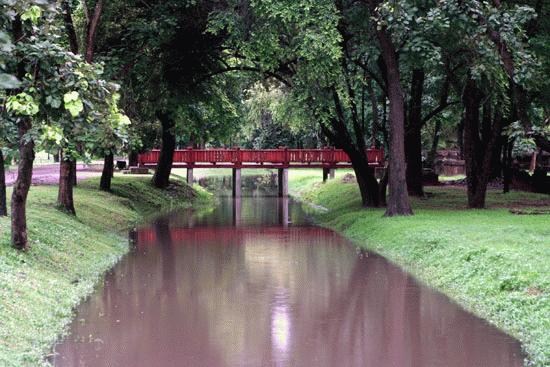 Walkpath over the canal near the historical city of Si Satchanalai