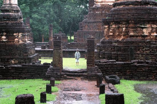 Peter gets caught in the monsoon rain at Si Satchanalai