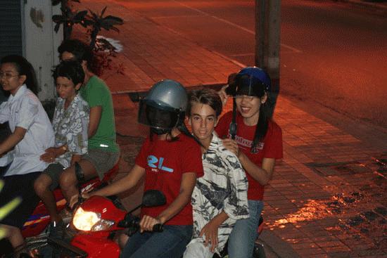 Peter takes an evening cycle ride with his new girlfriends in Lampang.