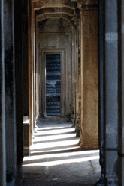 The symmetric hallways are impressive. This photo has 7 doorways.