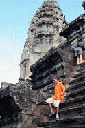 Peter climbs off an Angkor temple to get ready for the temple of Bayon