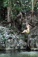 Peter imitates Tarzan at Barton Creek, Belize