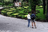 Therese and Fernindinha talk in the garden area of Bom Jesus.