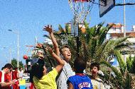 Peter skys for a rebound in the 3 on 3 basketball tourney in Barra with Tiago, Bernardo and Paul as his teamates.