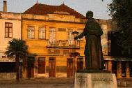 The plaza statute of a local bishop in the morning light in Ilhavo.