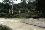 Peter and Paul walk over the Sungai Bohorok to our guest house. This was the river that flooded.