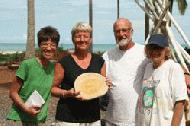 Therese and Carrol sell the first jack fruit cutting board to be donated to the Cape Pakarang Boat yard project.