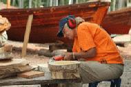 Carrol spent many days sanding and sketching the jack fruit cutting boards