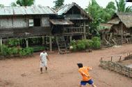 Our guides play  Tak Cor, the Laos national game, below our hut. Peter and Paul have become very good at this game.