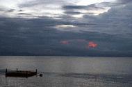 Sunset over the snorkeling platform at Coral Bay, Prehentian islands