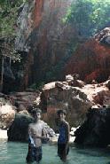 Peter and Therese explore the caverns near Phrang Nang beach