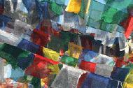 Prayer flags cover the sky across a temple on Observation Hill in Darjeeling.