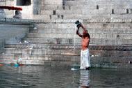 Bathing in the religious and sacred Ganges River.