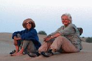Therese and Carrol enjoy the sunset over the desert